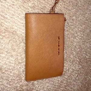 KORS wristlet/phone wallet luggage & goldtone.EUC
